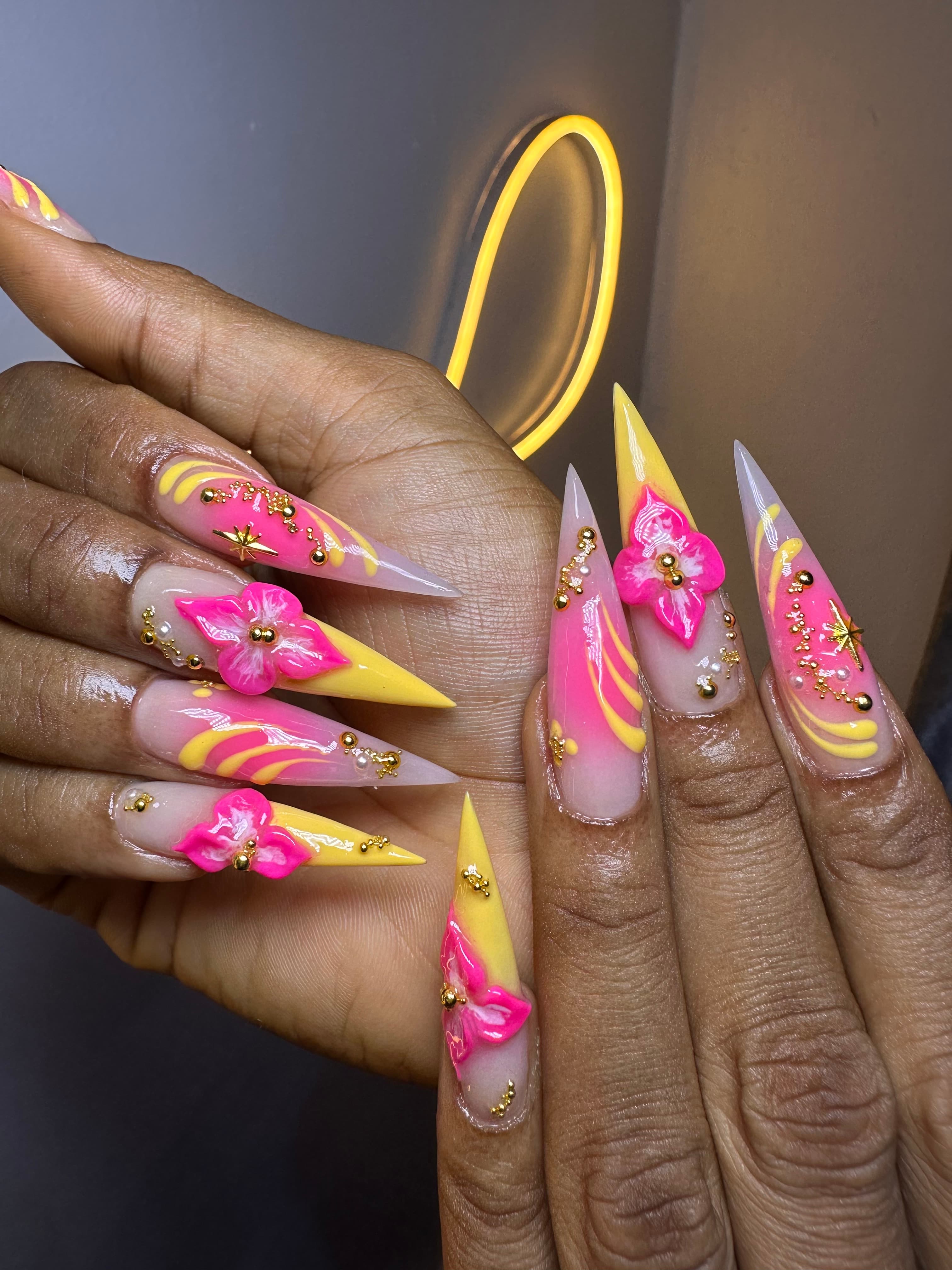 Bedazzled yellow French & pink aura nails with 3D flower