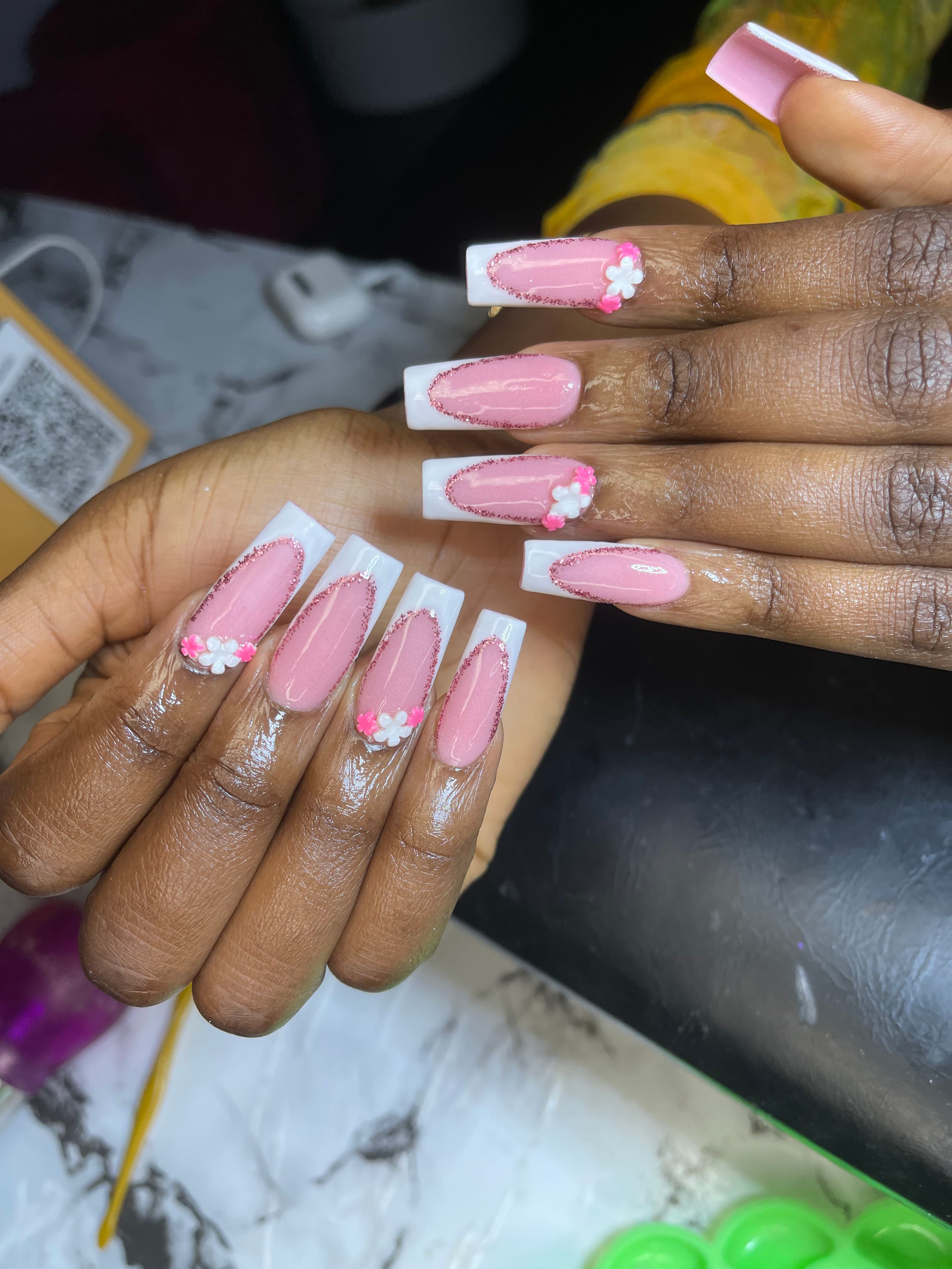 Square shaped French tips with coral flowers